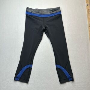 Lululemon run inspire crop II athletic leggings size 8 black with blue trim